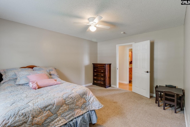 1162 Whippoorwill Rd, Camden, SC 29020 - carpeted bedroom with a ceiling fan and a textured ceiling