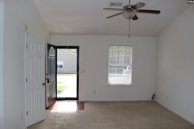 206 Windsor Village Dr, Columbia, SC 29223 - foyer entrance featuring light carpet, a ceiling fan, and vaulted ceiling