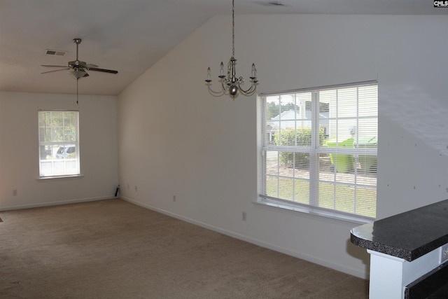 206 Windsor Village Dr, Columbia, SC 29223 - unfurnished dining area with vaulted ceiling, ceiling fan, light carpet, and a chandelier