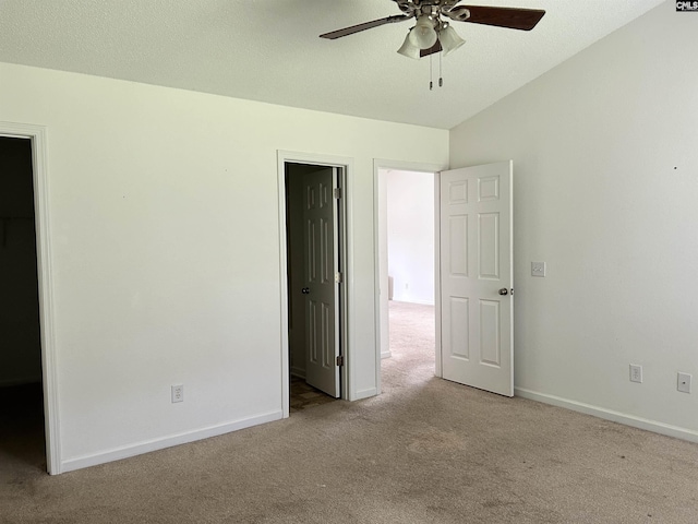 206 Windsor Village Dr, Columbia, SC 29223 - unfurnished bedroom with carpet flooring, lofted ceiling, and ceiling fan