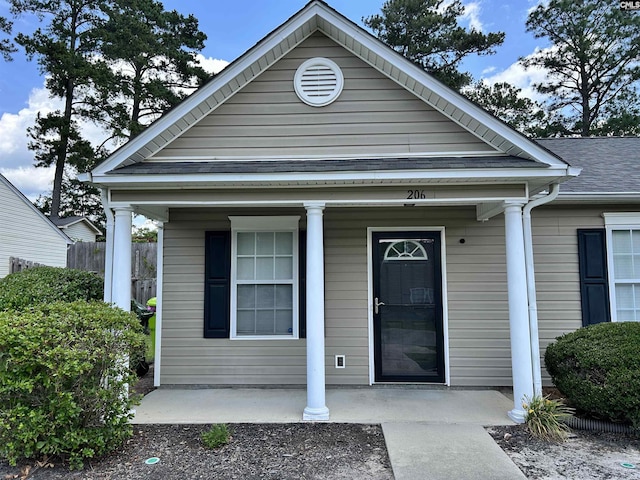206 Windsor Village Dr, Columbia, SC 29223 - entrance to property featuring a porch and a shingled roof