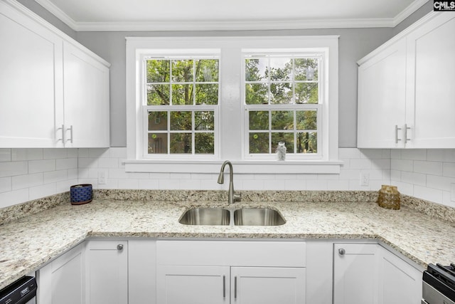 2625 Harrison Rd, Columbia, SC 29204 - kitchen with white cabinets, backsplash, crown molding, dishwasher, and light stone counters
