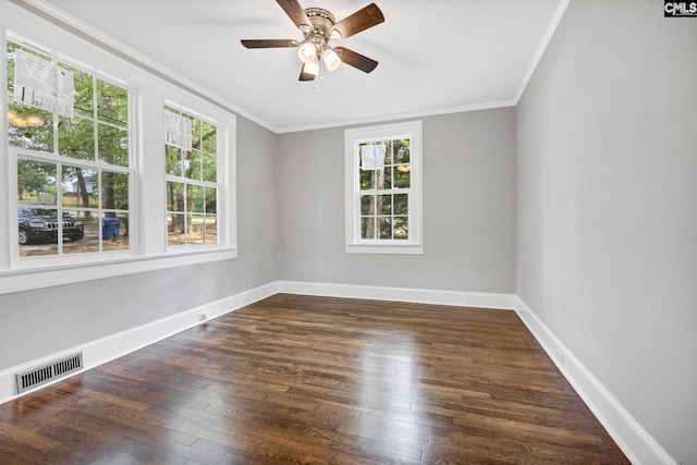 2625 Harrison Rd, Columbia, SC 29204 - spare room with plenty of natural light, crown molding, wood finished floors, and a ceiling fan