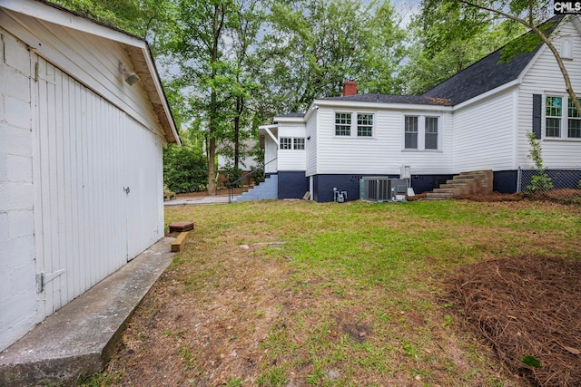 2625 Harrison Rd, Columbia, SC 29204 - rear view of house with a chimney and a yard