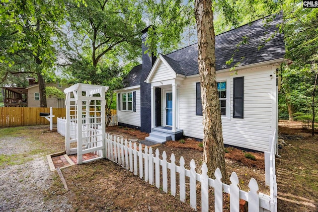 2625 Harrison Rd, Columbia, SC 29204 - cape cod home featuring a chimney and a shingled roof