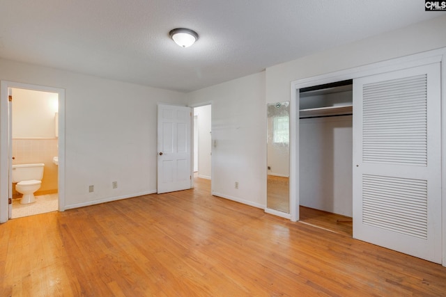 109 Garden Springs Rd, Columbia, SC 29209 - unfurnished bedroom with light wood-type flooring, a closet, and connected bathroom