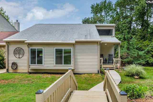 131 Leeward Rd, Columbia, SC 29212 - back of house featuring a yard, a deck, and roof with shingles