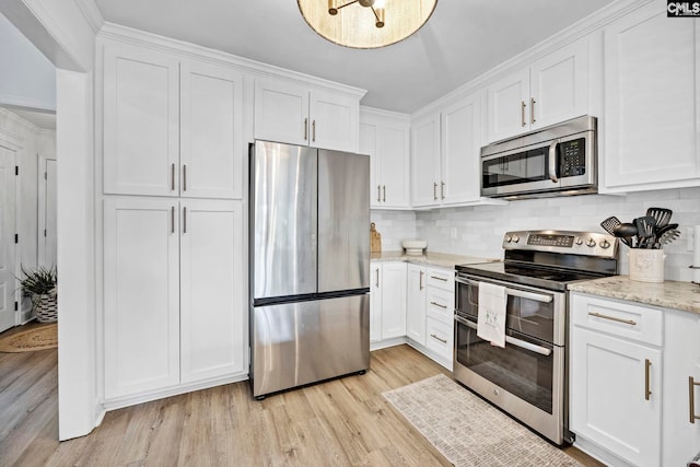 131 Leeward Rd, Columbia, SC 29212 - kitchen with stainless steel appliances, light wood-style flooring, and white cabinetry