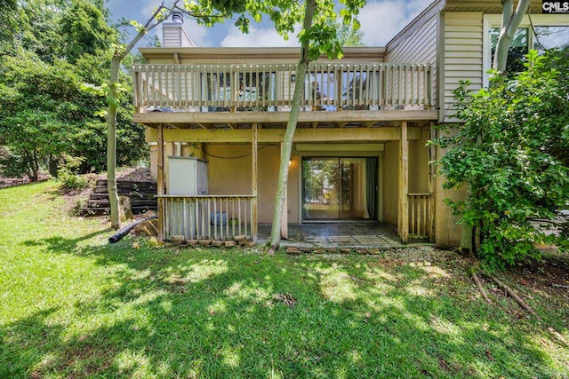 131 Leeward Rd, Columbia, SC 29212 - rear view of house with a yard, a chimney, and a deck