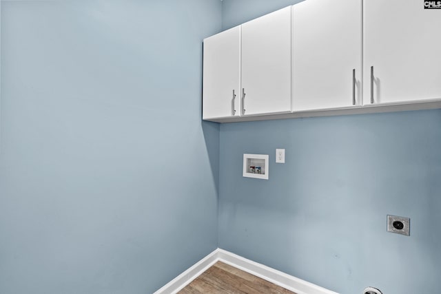 2 Alverston Ct, Irmo, SC 29063 - washroom with electric dryer hookup, cabinet space, washer hookup, and light wood finished floors