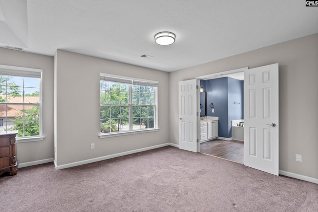 2 Alverston Ct, Irmo, SC 29063 - unfurnished bedroom featuring carpet floors and connected bathroom