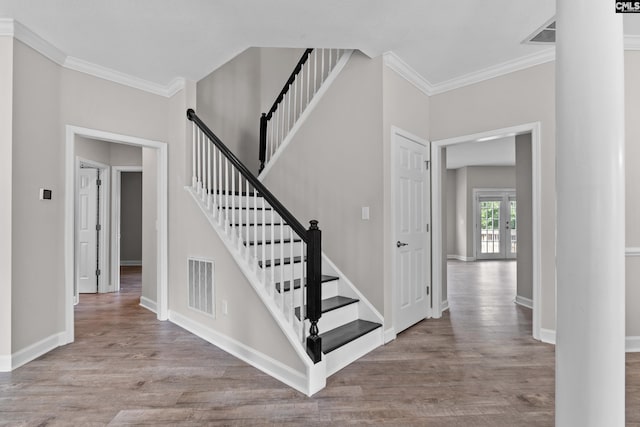 2 Alverston Ct, Irmo, SC 29063 - stairway with wood finished floors and ornamental molding