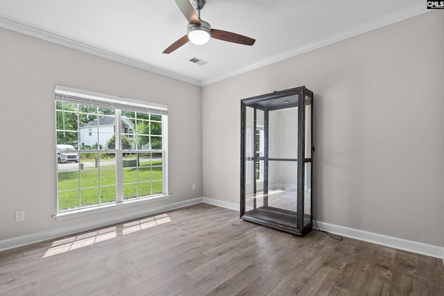 2 Alverston Ct, Irmo, SC 29063 - spare room with wood finished floors, ornamental molding, and ceiling fan