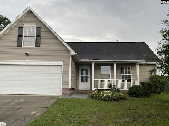 205 Hamilton Place Rd, Columbia, SC 29229 - view of front of property with a porch, a front yard, concrete driveway, brick siding, and a garage