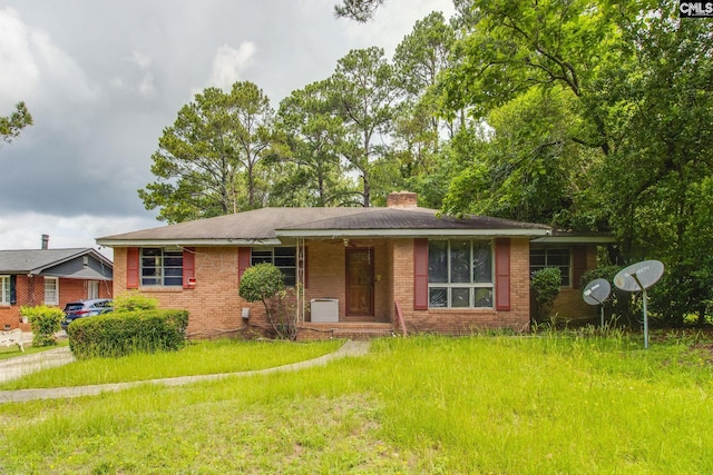 105 Bowling Ave, Columbia, SC 29203 - view of front facade with brick siding and a chimney