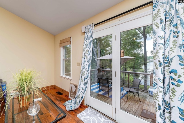 1326 Cedar Cove Rd, Camden, SC 29020 - doorway to outside featuring plenty of natural light and wood finished floors