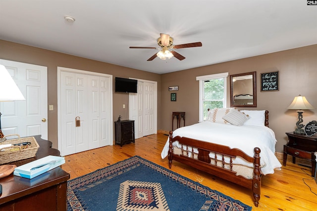 1326 Cedar Cove Rd, Camden, SC 29020 - bedroom featuring light wood finished floors, multiple closets, and ceiling fan
