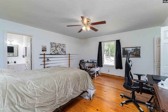 1326 Cedar Cove Rd, Camden, SC 29020 - bedroom with light wood-type flooring, ensuite bath, and a ceiling fan