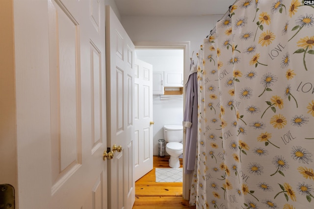 1326 Cedar Cove Rd, Camden, SC 29020 - full bathroom with wood finished floors and a shower with shower curtain