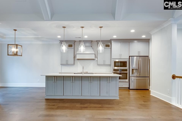 196 Osprey Pointe Ln, Prosperity, SC 29127 - kitchen with stainless steel appliances, premium range hood, recessed lighting, gray cabinetry, and light countertops
