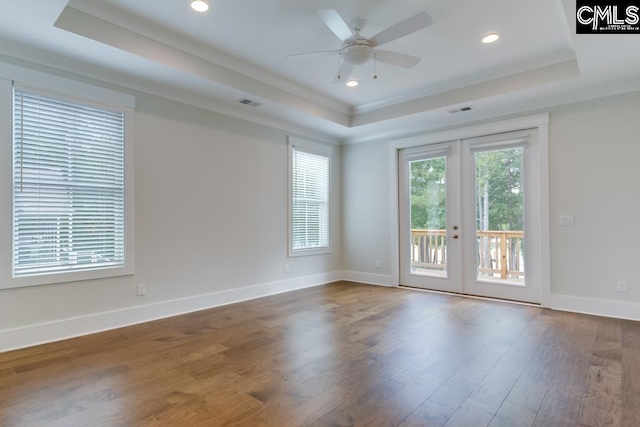 196 Osprey Pointe Ln, Prosperity, SC 29127 - unfurnished room with a raised ceiling, french doors, wood finished floors, a ceiling fan, and recessed lighting
