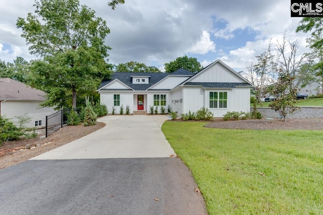 196 Osprey Pointe Ln, Prosperity, SC 29127 - modern farmhouse featuring asphalt driveway and board and batten siding