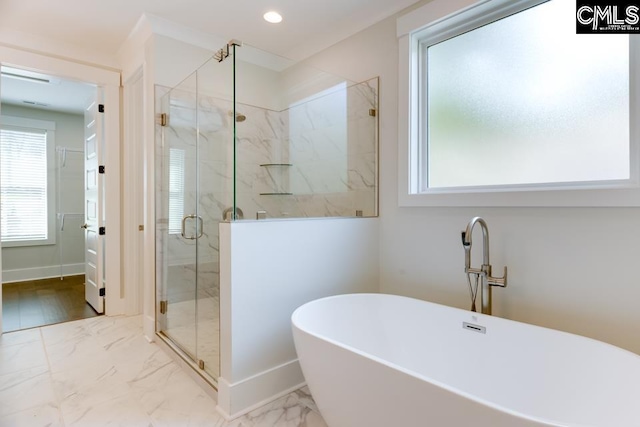 196 Osprey Pointe Ln, Prosperity, SC 29127 - bathroom with a freestanding bath, a marble finish shower, marble finish floors, and recessed lighting