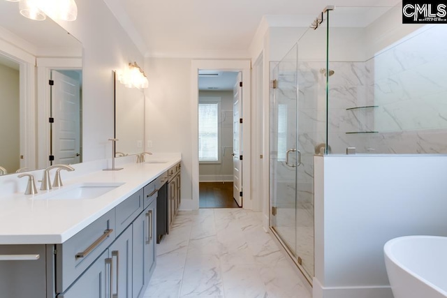 196 Osprey Pointe Ln, Prosperity, SC 29127 - full bath with a marble finish shower, double vanity, a freestanding bath, and marble finish floors