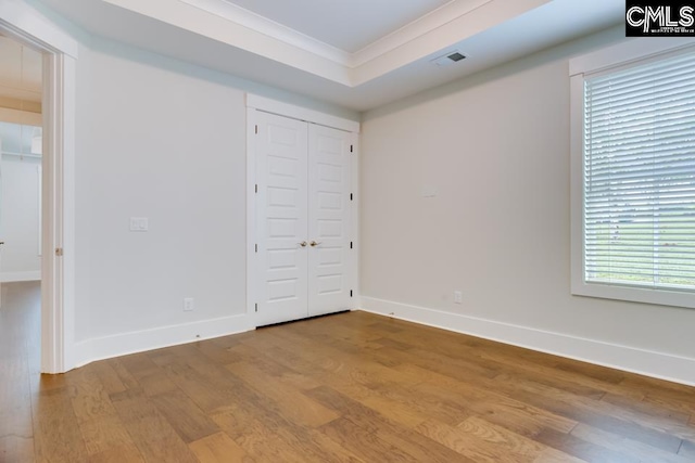 196 Osprey Pointe Ln, Prosperity, SC 29127 - unfurnished bedroom featuring wood finished floors and crown molding
