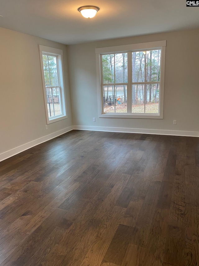 196 Osprey Pointe Ln, Prosperity, SC 29127 - spare room featuring dark wood-style floors and baseboards