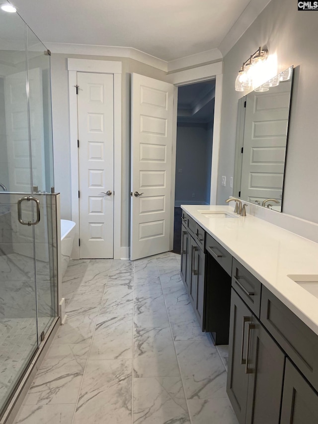 196 Osprey Pointe Ln, Prosperity, SC 29127 - full bathroom featuring marble look tile flooring, double vanity, a freestanding bath, a stall shower, and ornamental molding