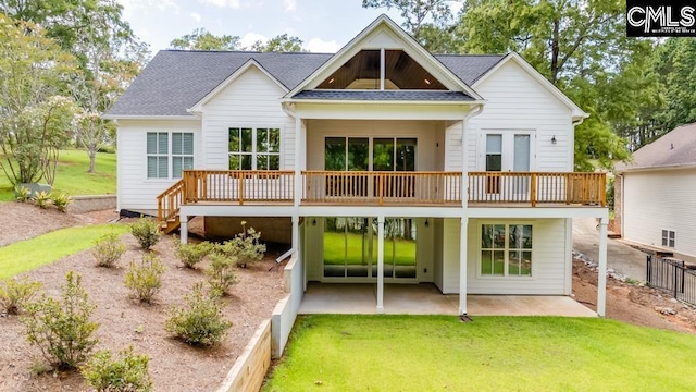 196 Osprey Pointe Ln, Prosperity, SC 29127 - back of property with a patio area, a lawn, a wooden deck, and roof with shingles