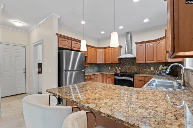 5 Shaftesbury Ln, Columbia, SC 29209 - kitchen featuring wall chimney range hood, black electric range, freestanding refrigerator, a peninsula, and decorative backsplash