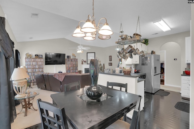 201 Summit Ridge Cir, Columbia, SC 29229 - dining space with arched walkways, a ceiling fan, vaulted ceiling, and a chandelier