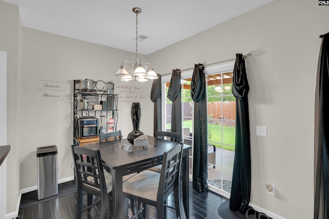 201 Summit Ridge Cir, Columbia, SC 29229 - dining space featuring a chandelier and dark wood-style floors