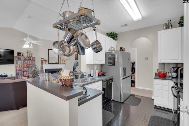 201 Summit Ridge Cir, Columbia, SC 29229 - kitchen with open floor plan, black appliances, ceiling fan, dark countertops, and arched walkways
