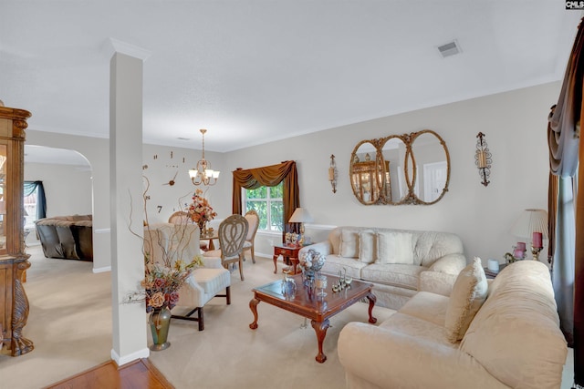 201 Summit Ridge Cir, Columbia, SC 29229 - carpeted living room with a chandelier, arched walkways, and crown molding