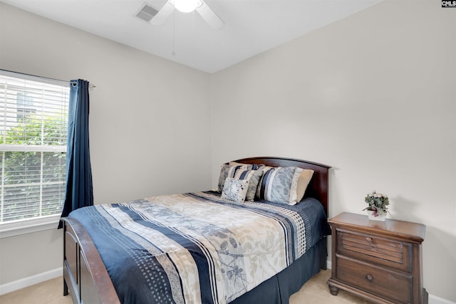 201 Summit Ridge Cir, Columbia, SC 29229 - bedroom with light colored carpet, multiple windows, and a ceiling fan