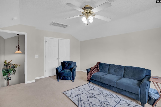 201 Summit Ridge Cir, Columbia, SC 29229 - living room with lofted ceiling, carpet floors, a ceiling fan, and a textured ceiling