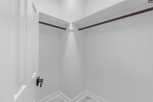 232 Burbank St, Columbia, SC 29210 - walk in closet featuring light marble finish floors