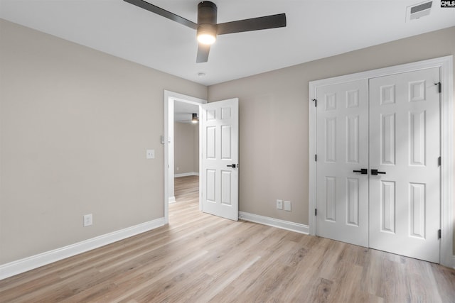 232 Burbank St, Columbia, SC 29210 - unfurnished bedroom with light wood finished floors, a closet, and ceiling fan