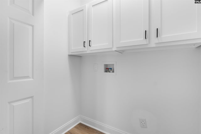 232 Burbank St, Columbia, SC 29210 - laundry area with cabinet space, hookup for a washing machine, wood finished floors, and hookup for an electric dryer