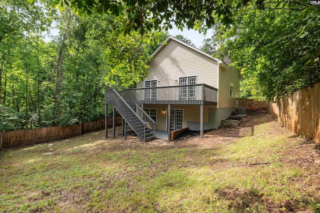 232 Burbank St, Columbia, SC 29210 - rear view of house featuring a wooden deck, stairs, and a fenced backyard