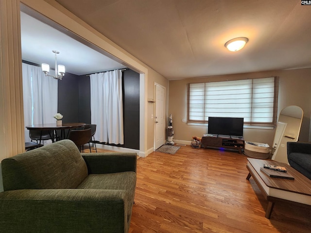 334 Gaffney St, West Columbia, SC 29169 - living room featuring a chandelier and light wood-style floors