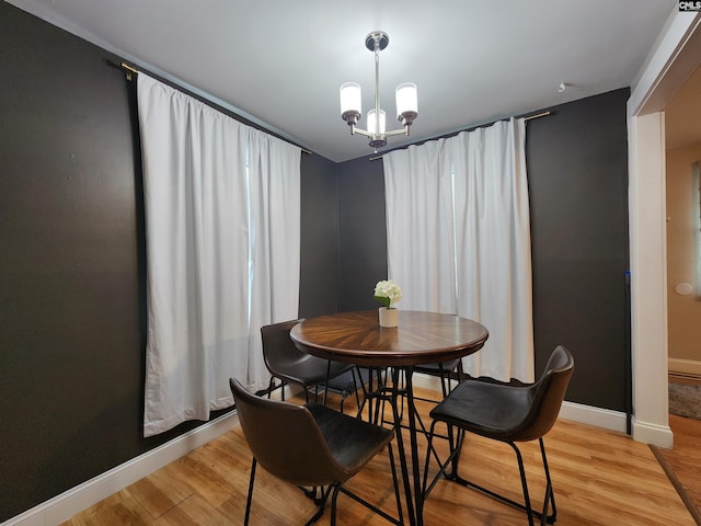 334 Gaffney St, West Columbia, SC 29169 - dining room featuring light wood-style flooring and a chandelier