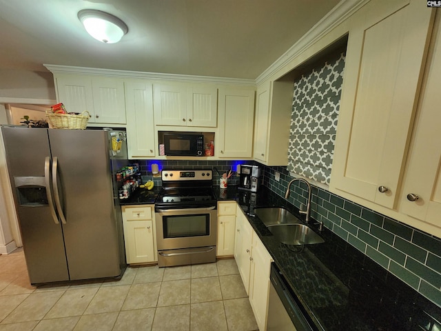 334 Gaffney St, West Columbia, SC 29169 - kitchen featuring stainless steel appliances, light tile patterned flooring, backsplash, and dark stone counters