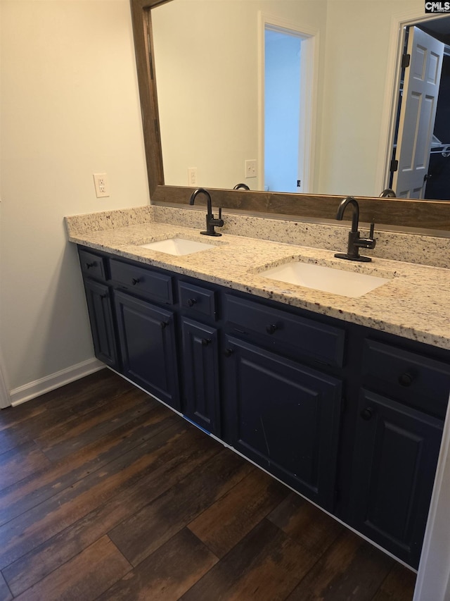261 Long Rd, Saluda, SC 29138 - full bath featuring double vanity and wood finished floors