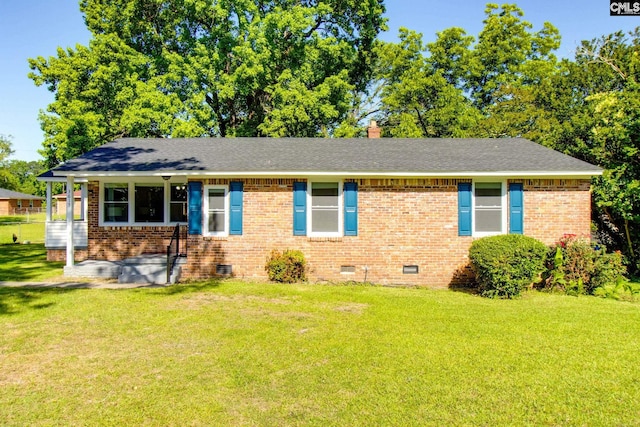 3615 Truman St, Columbia, SC 29204 - view of front facade with crawl space, a front yard, and brick siding