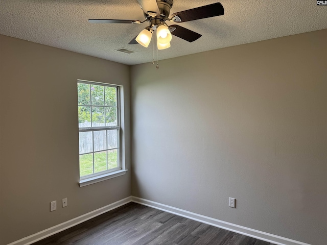 220 Sterling Cross Dr, Columbia, SC 29229 - spare room with dark wood finished floors, ceiling fan, and a textured ceiling