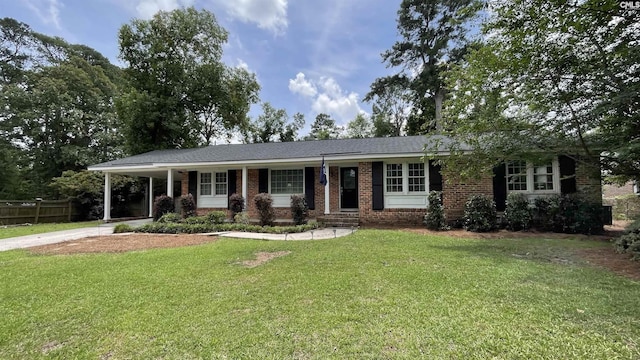 6965 Shelley Rd, Columbia, SC 29209 - ranch-style house featuring driveway, a carport, and brick siding